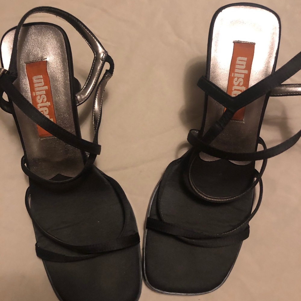 Strappy black dress shoes